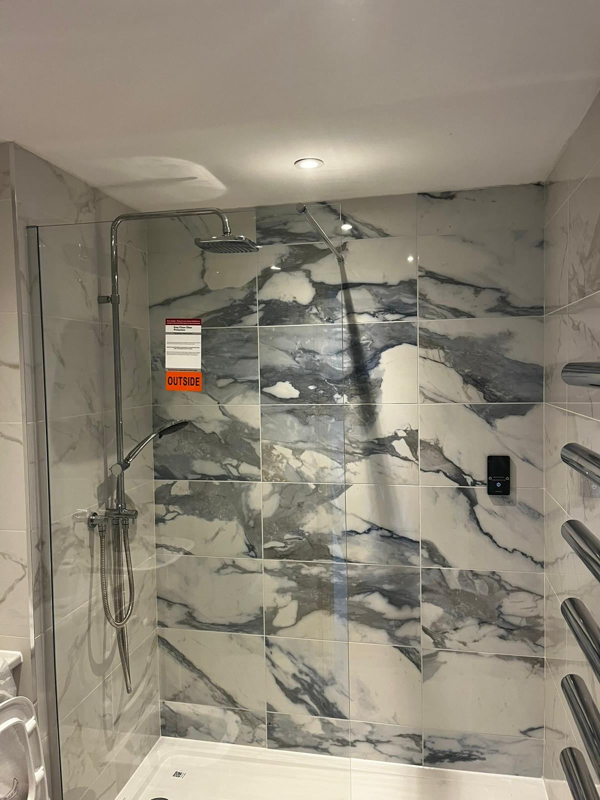 Finished marble-tiled shower